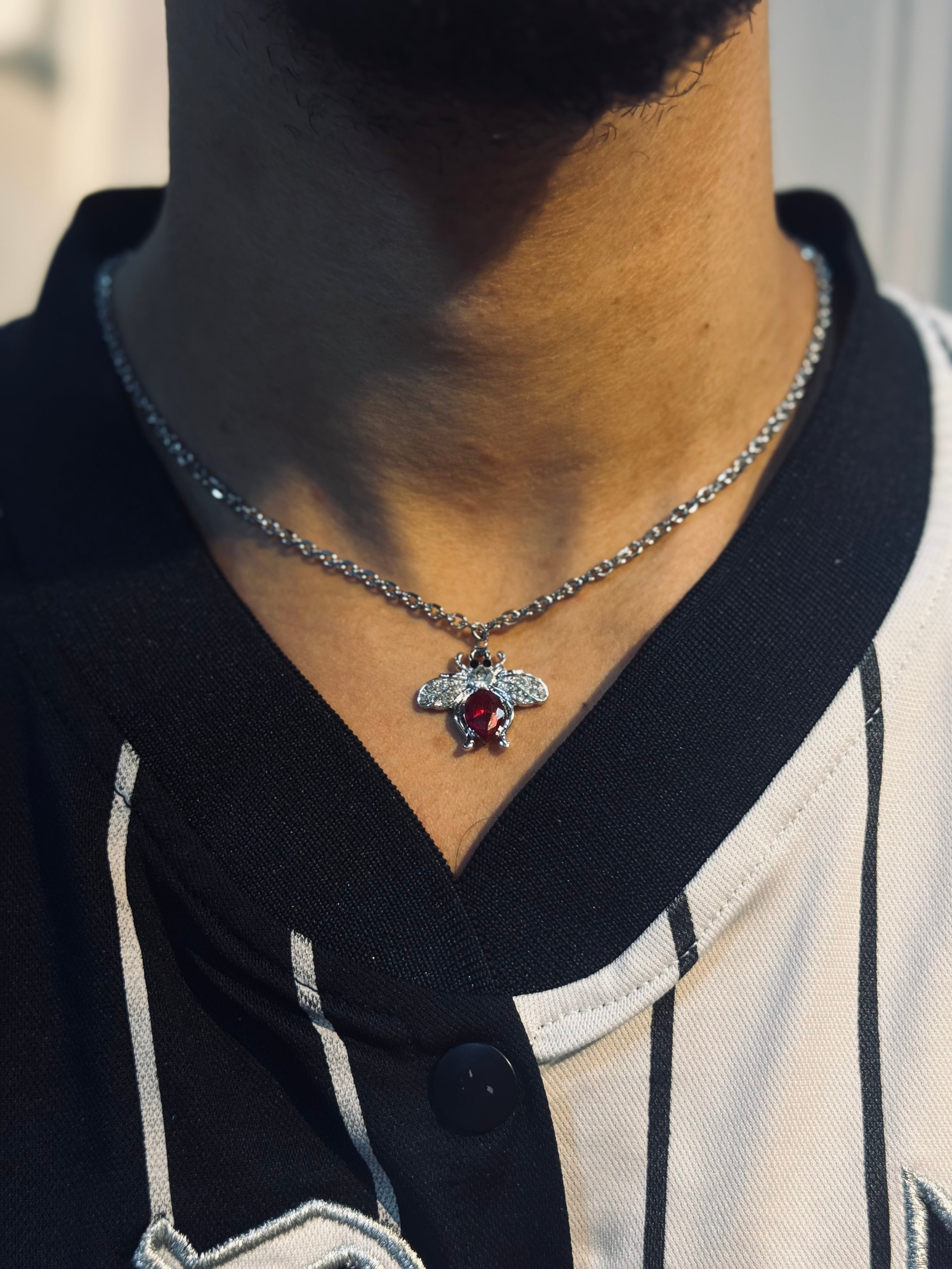 Flies with a red heart